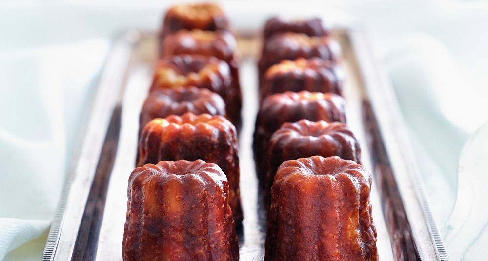 Canelés med smak av vanilje og appelsin