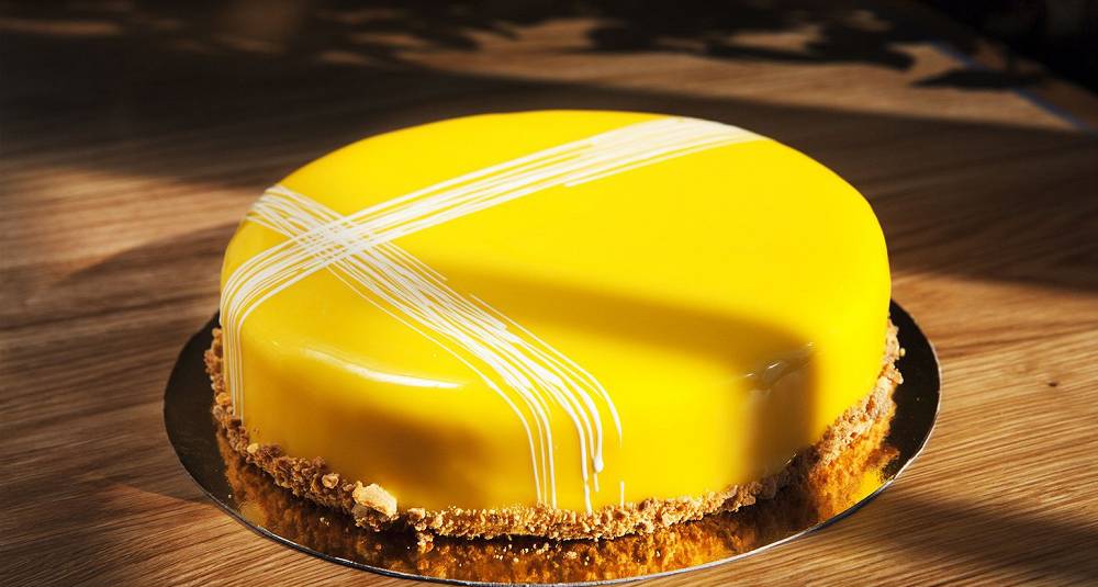 Denne kaken vil skinne som sola på kakebordet