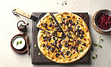 Reinskav på pizzaen oppleves både eksotisk og skaper stor steming