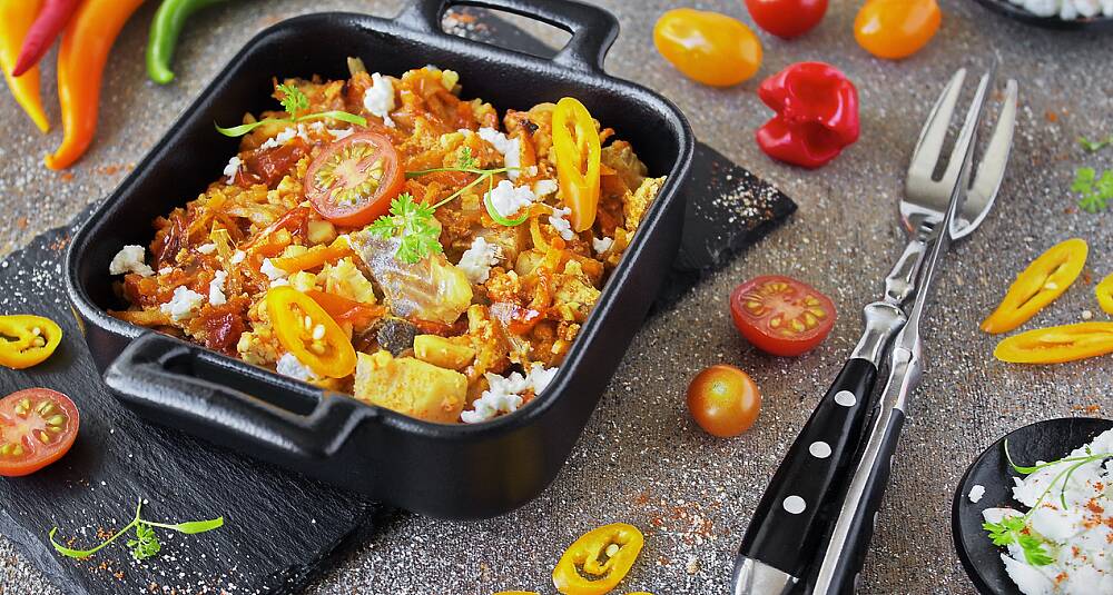 Klippfisk i form med chili, paprika, tomat og ost